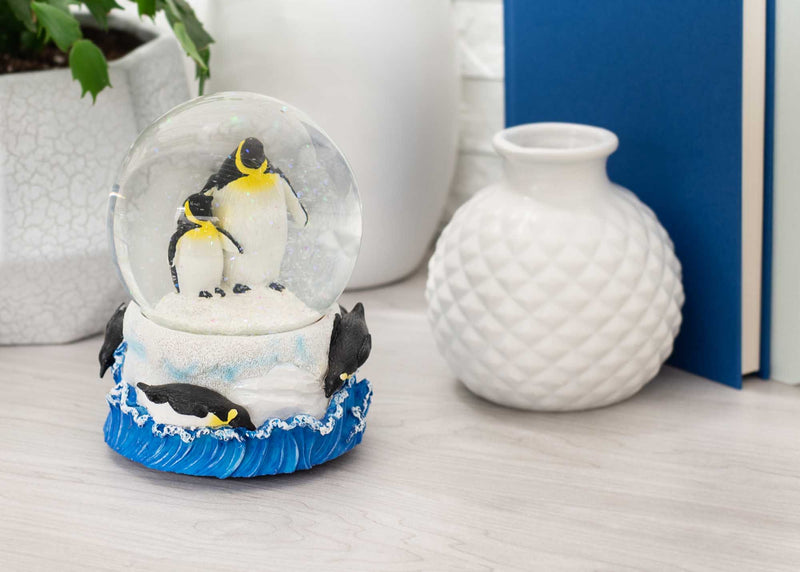 Playful Penguins Figurine 100MM Water Globe Plays Tune Entertainer