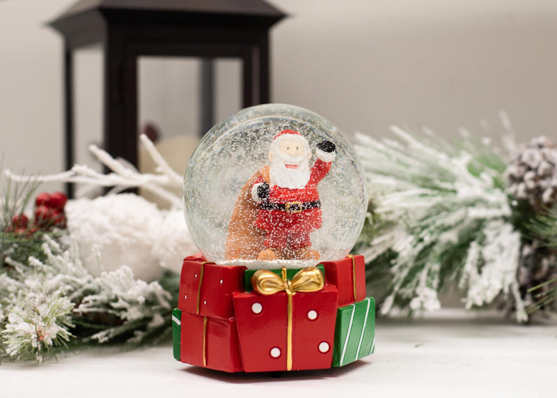 Santa Presents Red 5.5 x 4.3 Resin Snow Globe Plays Jolly Old Saint Nicholas
