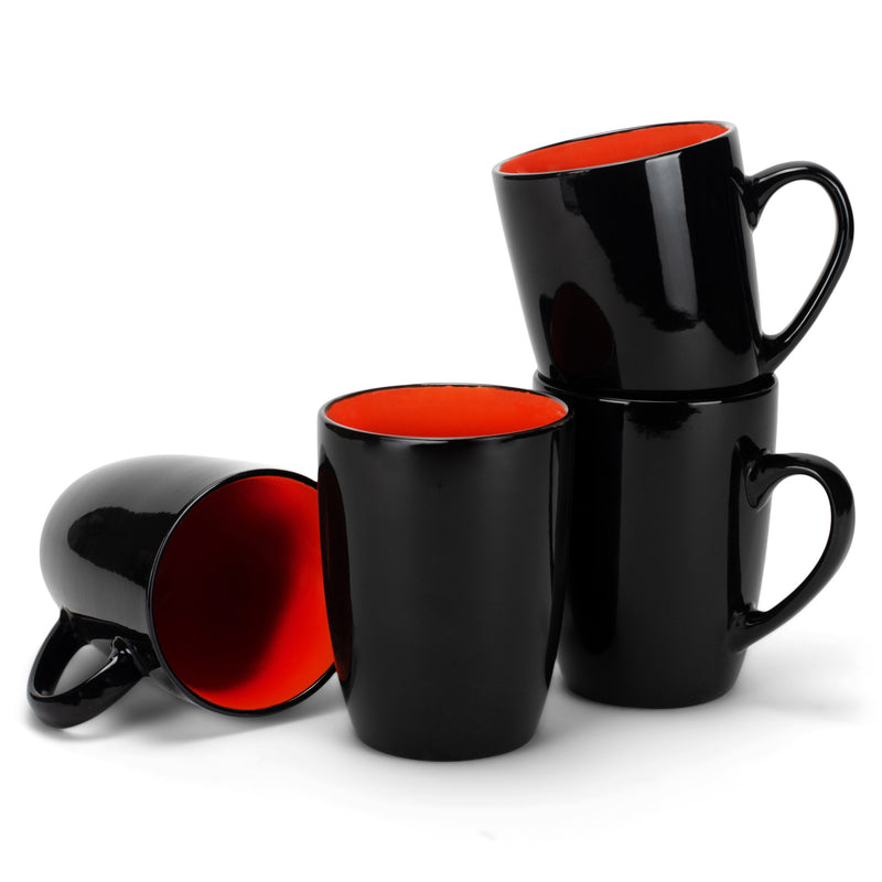 Group of orange and black mugs