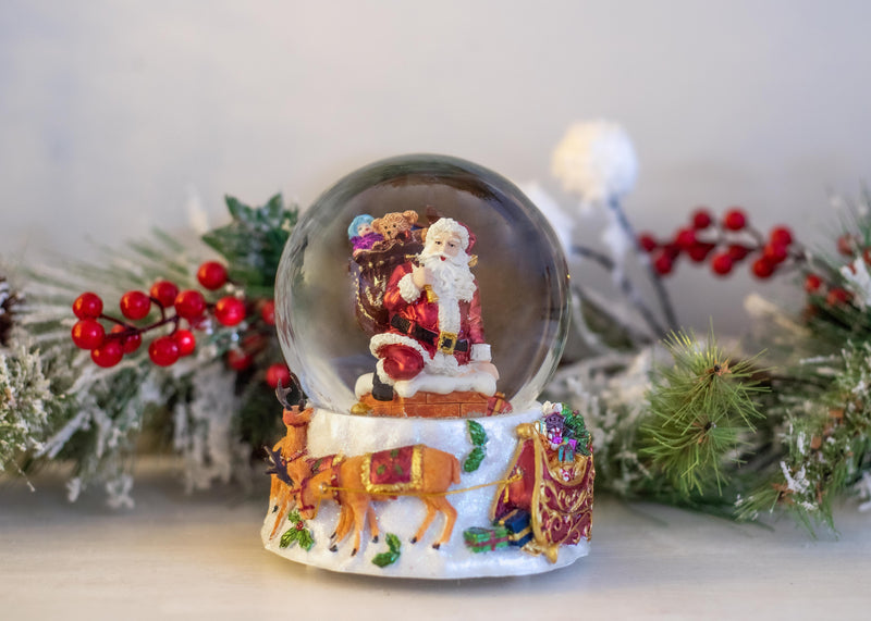 Elanze Designs Reindeer 120 MM Christmas Snow Globe Plays Here Comes Santa Claus